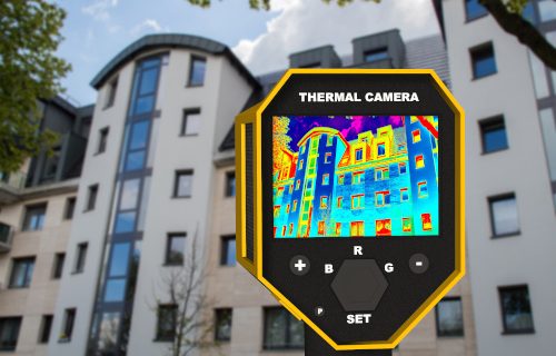 infrared thermal imager showing building facade and window heat loss